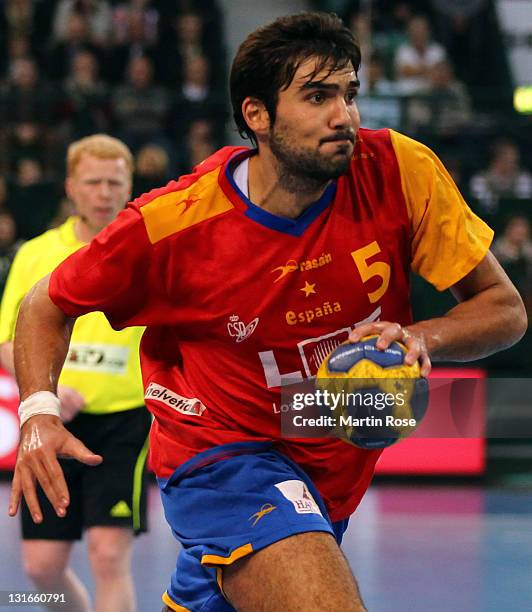 Jorge Maqueda of Spain throws the ball during the Mens' Handball Supercup match between Germany and Spain at Gerry Weber stadium on November 6, 2011...