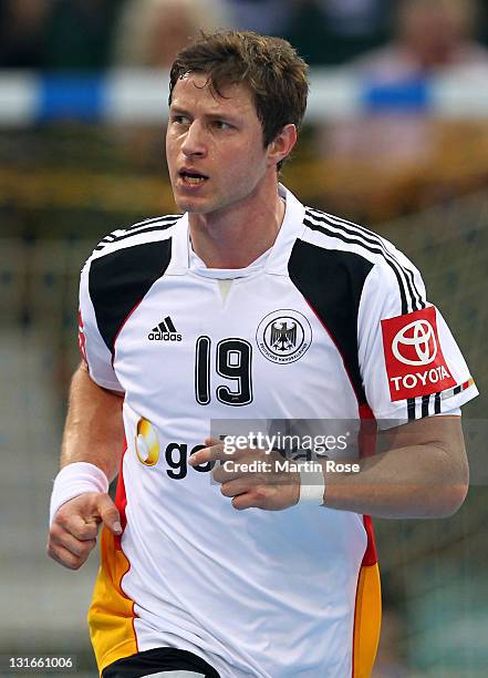 Martin Strobel of Germany looks on during the Mens' Handball Supercup match between Germany and Spain at Gerry Weber stadium on November 6, 2011 in...