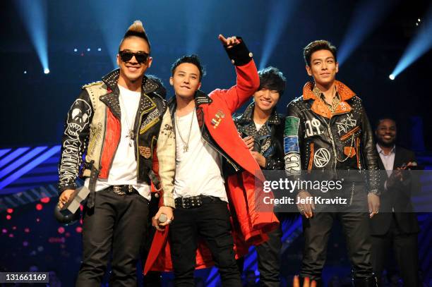 Dragon, Taeyang, T.O.P, Daesung and Seungri of Korean band Bigbang receive the Best Worldwide Award during the MTV Europe Music Awards 2011 live show...