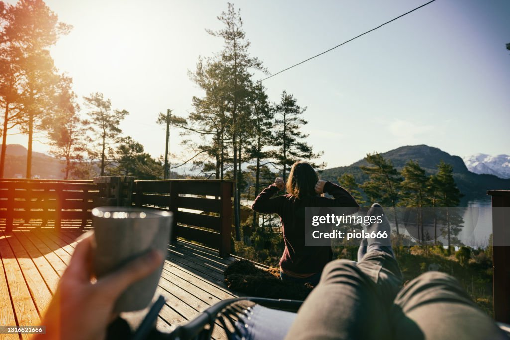 POV having breakfast in a majestic resort during summer in Norway