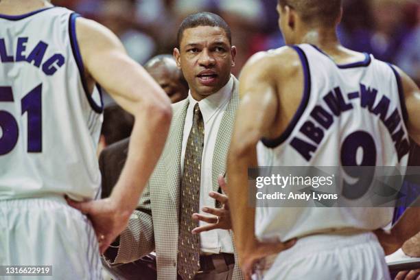 Doc Rivers, Head Coach for the Orlando Magic gives out instructions to Shooting Guard Tariq Abdul-Wahad from the side line during the NBA Atlantic...