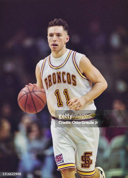 Steve Nash, Guard for the Santa Clara University Broncos dribbles the basketball down court during the NCAA Atlantic Coast Conference college...