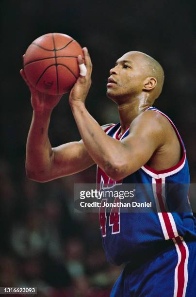 Derrick Coleman, Power Forward and Center for the New Jersey Nets prepares to shoot a free throw during the NBA Central Division basketball game...