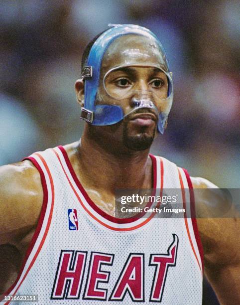 Alonzo Mourning, Center and Power Forward for the Miami Heat wearing a face protecting mask during the NBA Atlantic Division basketball game against...