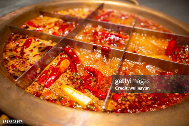 the boiling chongqing hot pot - szechuan cuisine stock-fotos und bilder