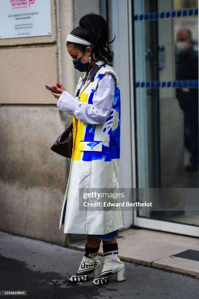 Street Style At Paris Fashion Week - Womenswear Spring Summer 2021 : Day Four