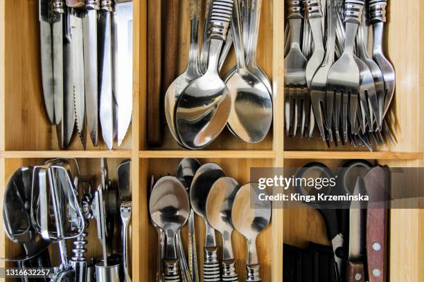 cutlery drawer arrangement - essbesteck stock-fotos und bilder