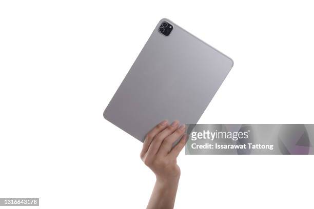hand holding rear tablet isolated on white background - human hand isolated stock pictures, royalty-free photos & images
