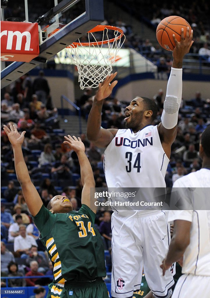 Exhibition game multiple pix for web and print; get first time players andre drummond, deAngelo Daniels, Ryan Boatright.