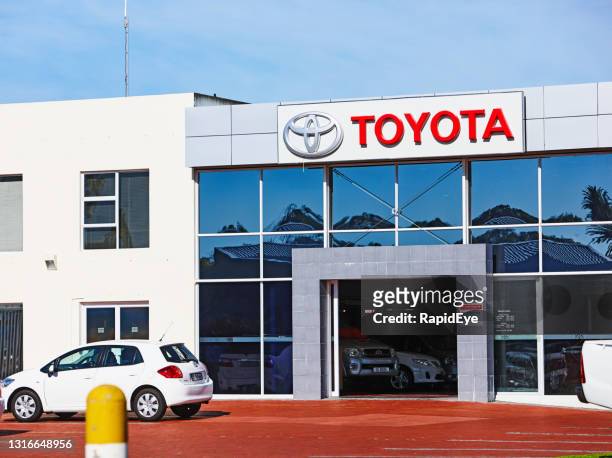 car dealership exterior on a bright sunny day in cape town, south africa - toyota south africa motors stock pictures, royalty-free photos & images