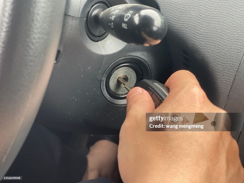 Start the car with the key.