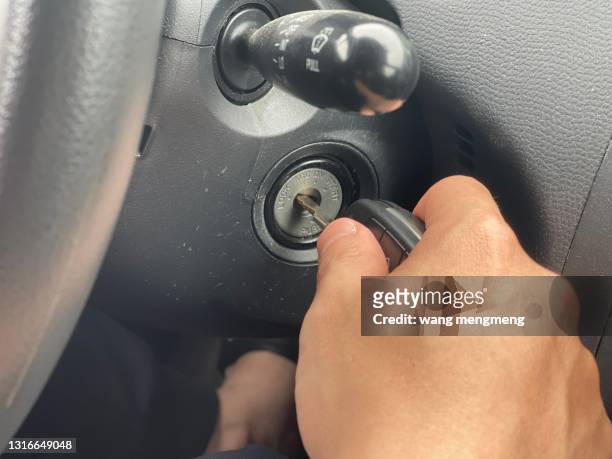 start the car with the key. - locksmith stock pictures, royalty-free photos & images