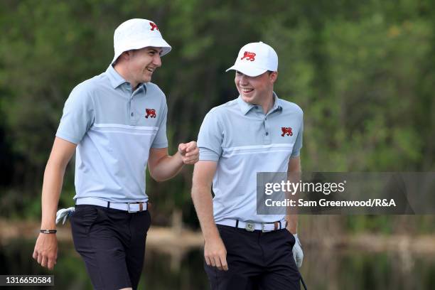 Barclay Brown of the Great Britain and Ireland Walker Cup team and Mark Power walk down the second hole during a practice day prior to The Walker Cup...