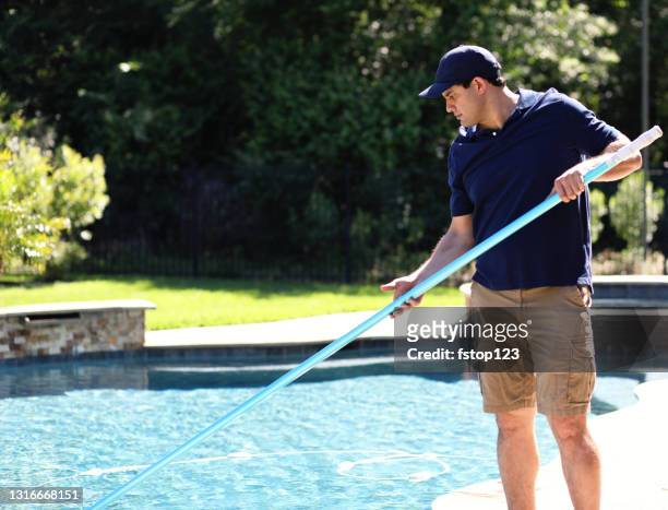 repairman, cleaning service man at home swimming pool - swimming pool cleaning stock pictures, royalty-free photos & images