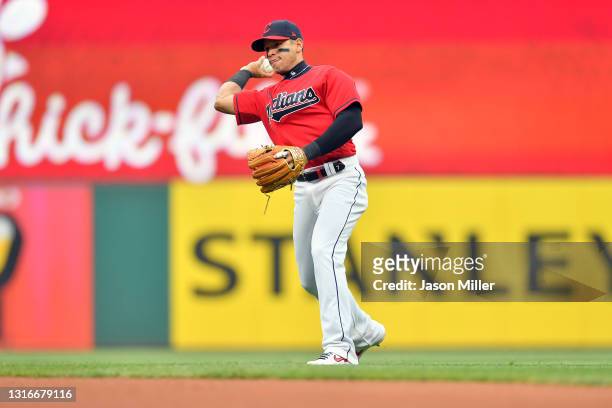 Second baseman Cesar Hernandez of the Cleveland Indians throws out Gleyber Torres of the New York Yankees at first during the fourth inning at...