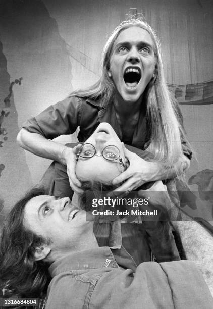 View of a production of the musical 'More Than You Deserve' at the Public Theater, New York, New York, November 1973. Pictured are, from top down,...