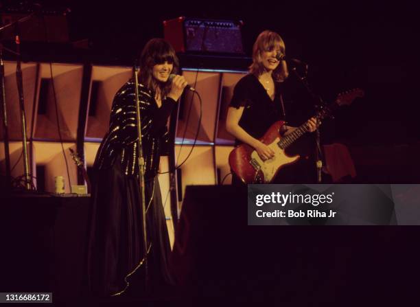 Ann and Nancy Wilson of group HEART perform in concert July 15, 1977 in Los Angeles, California.