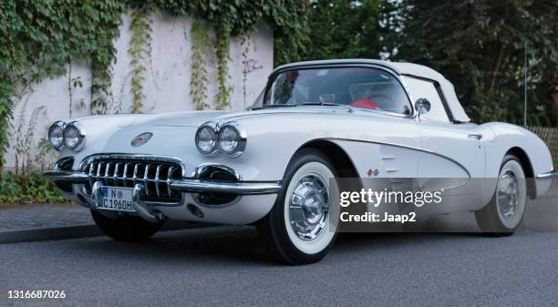 front view of a white german chevrolet corvette c1 convertible - old car logo stock pictures, royalty-free photos & images