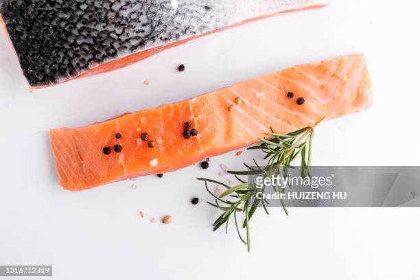 fresh salmon fish fillet. raw salmon fillets salt dill and rosemary on white - dining overlooking water stock pictures, royalty-free photos & images