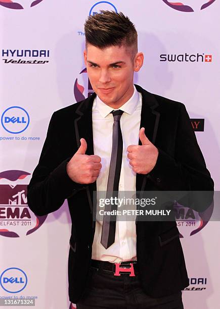 British actor Kieren Richardson poses on the red carpet at the MTV European Music Awards at the Odyssey Arena in Belfast, Northern Ireland, on...