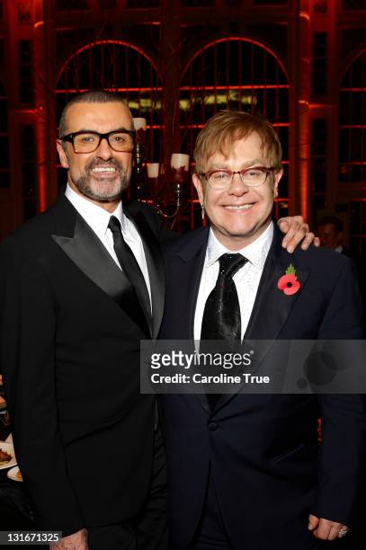 Musicians George Michael and Sir Elton John attend a charity performance benefiting the Elton John AIDS Foundation's newly created Elizabeth Taylor...