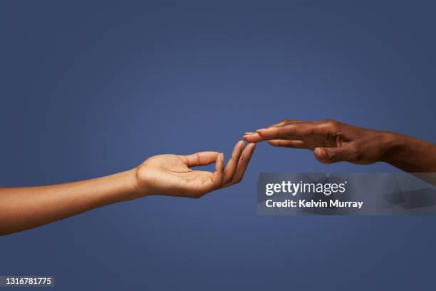 hands touching fingers - reach up stock pictures, royalty-free photos & images