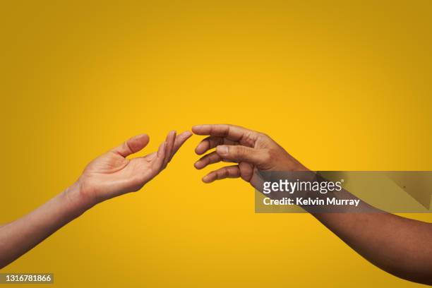 hands touching fingers - hand stockfoto's en -beelden