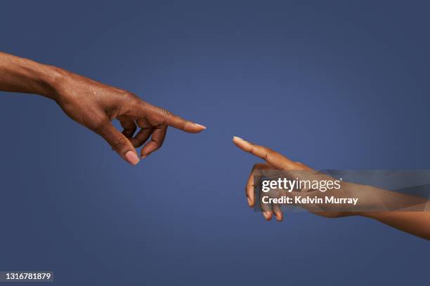 hands pointing fingers together - hand pointing stock pictures, royalty-free photos & images