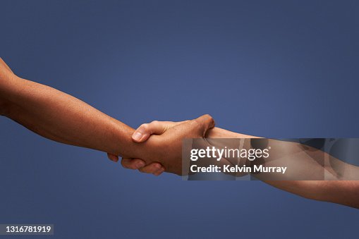 Close up of holding hands Close up of holding hands