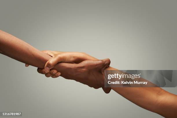 close up of holding hands - clingy girlfriend stock pictures, royalty-free photos & images