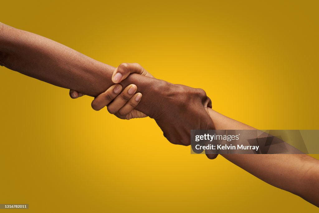 Close up of holding hands