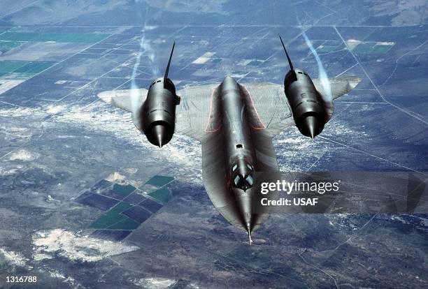 Air Force SR-71A, also known as the "Blackbird", is put through it''s paces during a test flight over Beale Air Force Base in California. The...