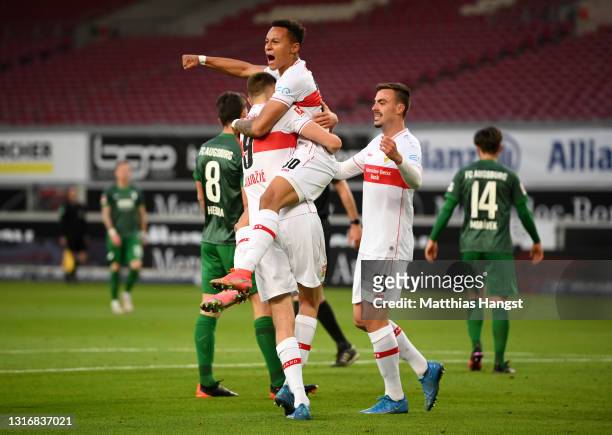 Philipp Foerster of VfB Stuttgart celebrates with team mates Sasa Kalajdzic and Roberto Massimo after scoring his team's first goal the Bundesliga...