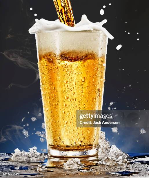 beer glass with foam - beer glasses stock pictures, royalty-free photos & images