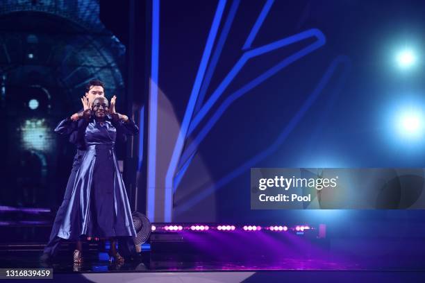 Auma Obama and Andrzej Cibis perform on stage during the 9th show of the 14th season of the television competition "Let's Dance" on May 07, 2021 in...