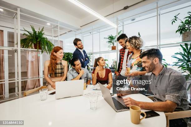 wide angle photo of innovative business people in office dealing with projects - esg stock pictures, royalty-free photos & images