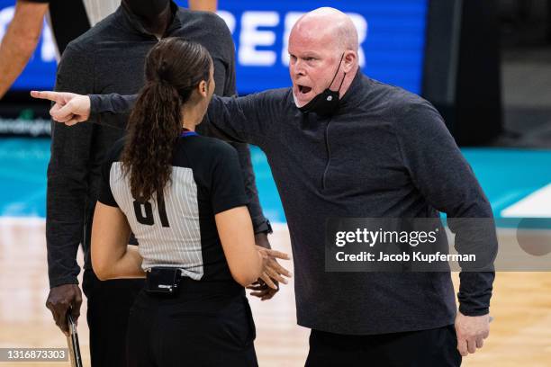 Orlando Magic head coach Steve Clifford expresses his frustrations to referee Simone Jelks in the first quarter during their game against the...