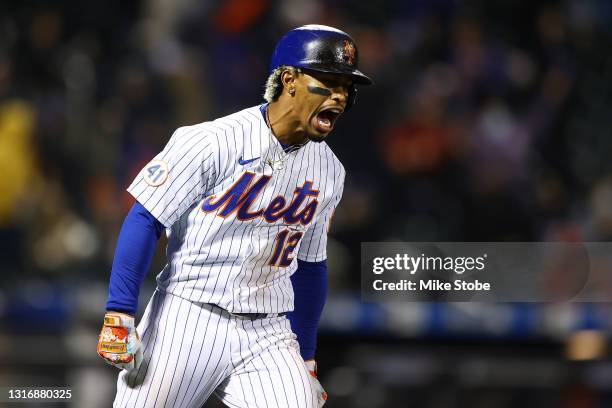 Francisco Lindor of the New York Mets reacts after hitting a two-run home run in the seventh inning against the Arizona Diamondbacks at Citi Field on...