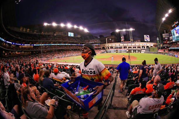 Vendor sells beer during the fourth inning of a game between the Houston Astros and the Toronto Blue Jays at Minute Maid Park on May 07, 2021 in...
