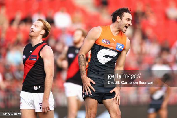 Jeremy Finlayson of the Giants celebrates kicking a goal during the round eight AFL match between the Greater Western Sydney Giants and the Essendon...