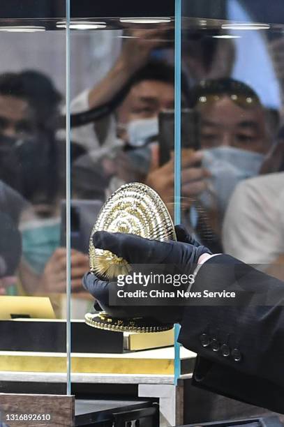 Faberge egg is on display during the first China International Consumer Products Expo at Hainan International Convention and Exhibition Center on May...
