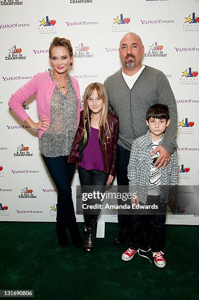 Talent agent Adam Venit , his wife Trina and their children Olivia and Matthew attend the Yahoo! Sports Presents A Day Of Champions event at the...