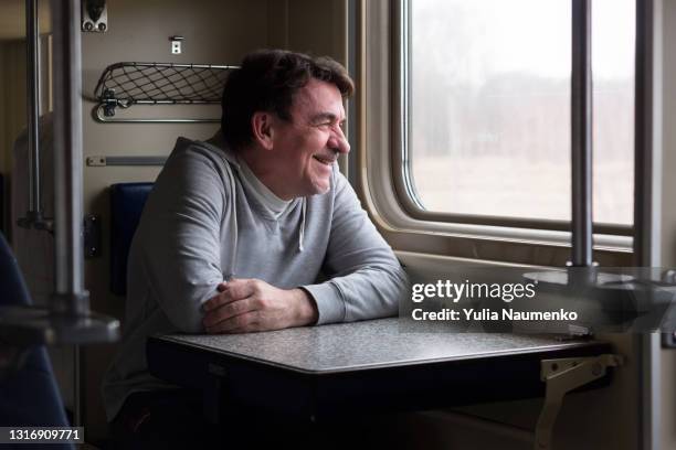 man in the second-class carriage in the russian train - coupe dessert stock pictures, royalty-free photos & images