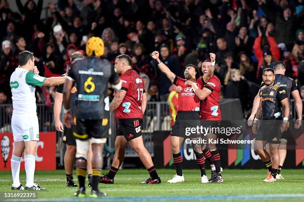 Richie Mo'unga of the Crusaders celebrates on full time with Bryn Hall during the Super Rugby Aotearoa Final match between the Crusaders and the...