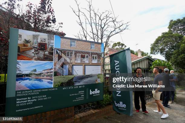 Prospective buyers attend an auction of a residential property in the suburb of Strathfield on May 08, 2021 in Sydney, Australia. Property prices...