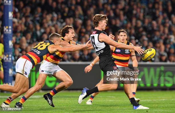 Mitch Georgiades of Port Adelaide snaps for goal during the round eight AFL match between the Port Adelaide Power and the Adelaide Crows at Adelaide...