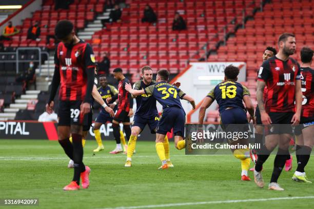 Will Forrester of Stoke City celebrates after scoring their team's first goal with Rhys Norrington-Davies of Stoke City during the Sky Bet...
