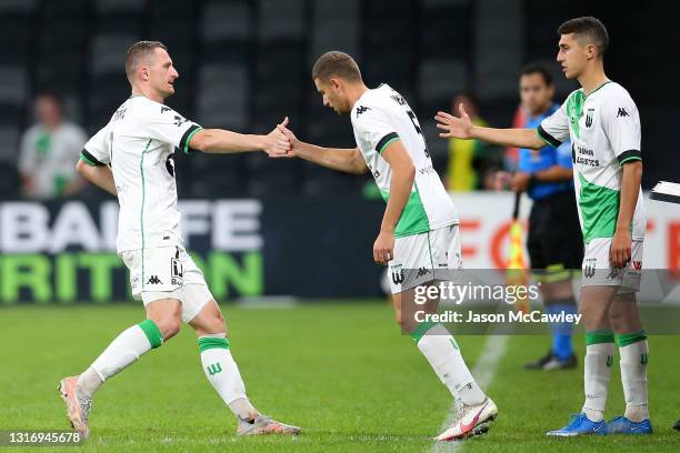 Dylan Pierias of Western United substitutes Besart Berisha of Western United during the A-League match between Western Sydney Wanderers and Western...