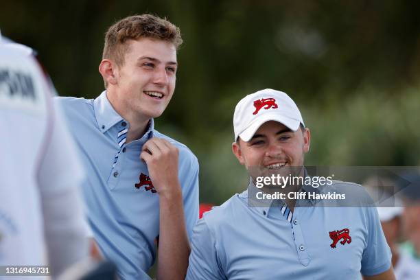 Barclay Brown and Alex Fitzpatrick of Team Great Britain and Ireland look on from the first tee during Day One of The Walker Cup at Seminole Golf...