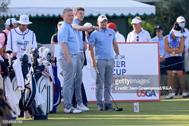 From left, Captain Stuart Wilson, Barclay Brown, and Alex Fitzpatrick of Team Great Britain and Ireland look on from the first tee during Day One of...